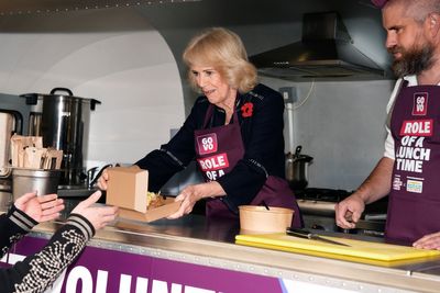 Queen Camilla dubbed a ‘natural’ as she serves jacket potatoes alongside TikTok star