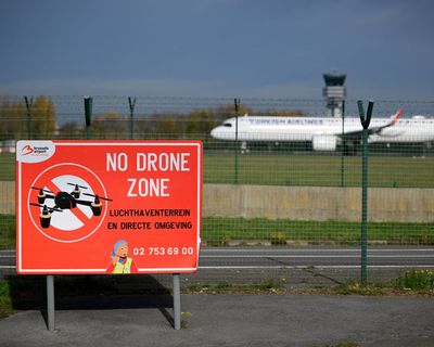 German police detain man suspected of painting swastikas on cars and walls with his own blood – as it happened