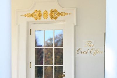 ‘Live, laugh, lose’: Trump hammered over golden Oval Office sign tacked to White House wall