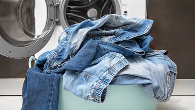 Experts recommend this $1 pantry staple to prevent your jeans from fading in the wash — here's why it works