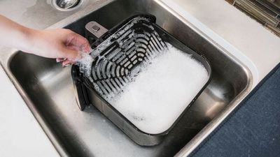 This air fryer cleaning hack is blowing up online – but experts are warning against it
