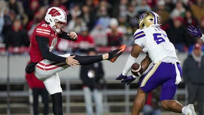 Wisconsin Shockingly Upsets No. 24 Washington As Punter Leads Team in Passing