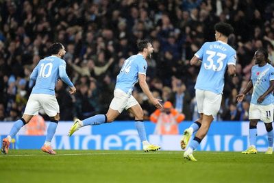 Manchester City ease past Liverpool in Pep Guardiola’s 1,000th game as boss