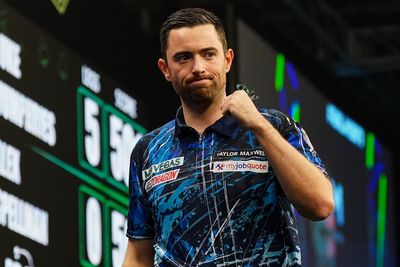 Luke Humphries hits nine-darter to beat Michael Smith at Grand Slam of Darts