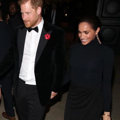 Meghan Markle Styles a Turtleneck Gown With a Leg Split, Bow Tie Sandals, and an Aquazzura Clutch