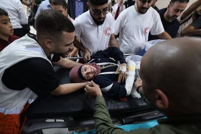Reuters journalist among Palestinians injured after Israeli settlers attack olive harvesters in West Bank