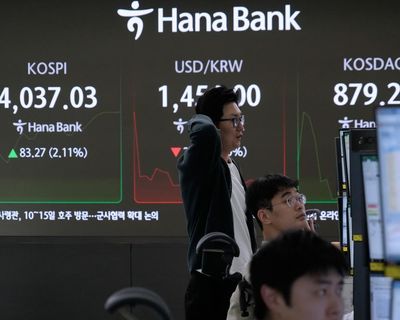 FTSE 100 hits record high as US shutdown breakthrough sparks market rally – as it happened