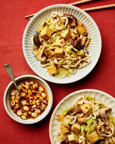 Rukmini Iyer’s quick and easy chilli crisp-topped noodles with tofu and cabbage – recipe