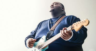 “When I was 15, I was hustling it out in the juke joint clubs – and then along came Mr. Buddy Guy…” From teenage prodigy to modern guitar royalty, Christone “Kingfish” Ingram is ushering in a new era for blues guitar