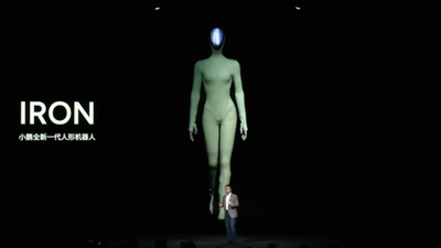 Xpeng CEO demonstrates the company's latest sashaying robot is in fact not a person in a morph suit by cutting off its flesh live on-stage