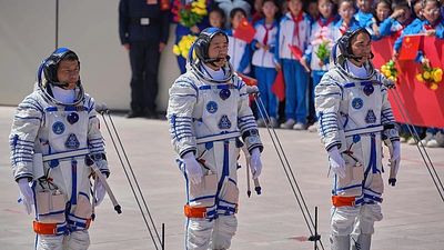 Stranded Chinese astronauts ‘in good condition,’ officials say after space debris delays return
