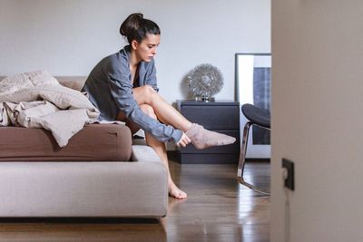 TikTok influencers are putting raw potato slices in their socks at bedtime. Experts weigh in on dubious health trend