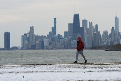 Arctic blast ‘absolutely shatters’ cold records in US - and chilly weather and ‘falling iguana advisory’ aren’t over yet