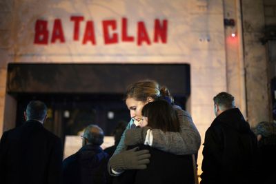 France honors victims 10 years after attacks at Bataclan concert hall, cafes and national stadium