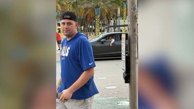 We Tracked Down the NFL Fan Who Took Viral Photo of Mike McDaniel Trolling After Win