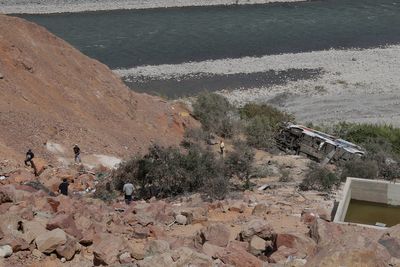 Passenger bus plunges into a ravine in southern Peru killing at least 37