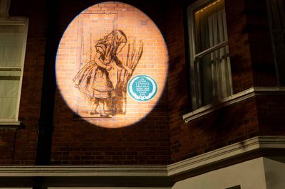 Plaque for Alice In Wonderland illustrator reinstalled after 65 years in storage