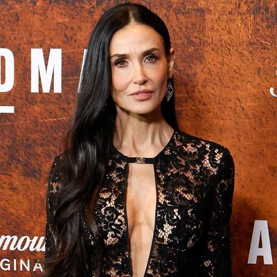 Demi Moore Carries Dakota Johnson's Gucci Naked Dressing Torch in a Sheer Lace Gown