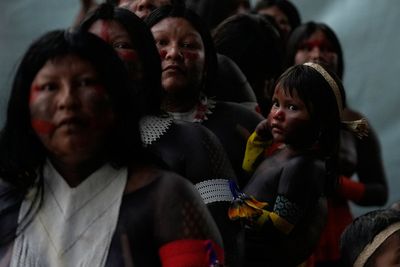 Photos show Indigenous participants at the People's Summit held alongside the COP30 climate meeting