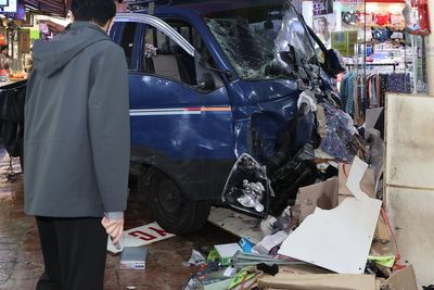 Truck crash in South Korea market kills 2 people and injures 18, officials say