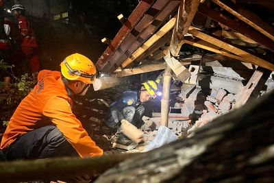 At least two dead and dozens missing after landslides in Indonesia’s Java island