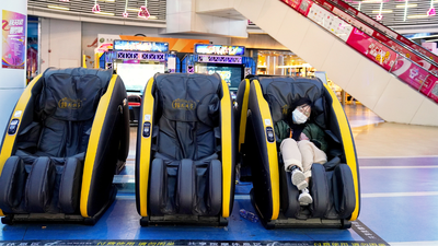 Man gets a little too relaxed on massage chair, unaware that his nap was about to go very wrong