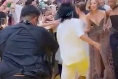 Watch: Fan jumps barrier and lunges at Ariana Grande on Wicked: For Good red carpet