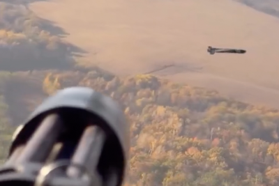 Russian drone blasted out of the sky by Ukrainian helicopter gunner