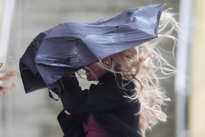 Parts of UK brace for month of rain in 24 hours as Storm Claudia hits