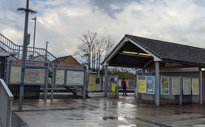 Man, 20, stabbed at London train station as police search for car driver seen minutes before attack