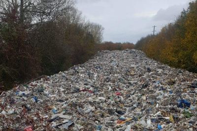 Fly-tippers dump ‘mountain of illegal waste’ near river