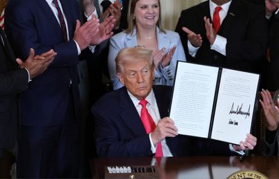 Questions arise over strikingly similar signatures by Trump on recent pardons
