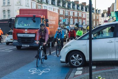 Britain's roads to be made narrower to stop drivers from overtaking cyclists in latest war on motorists