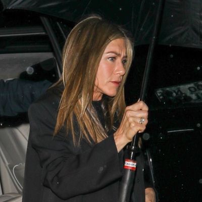 Jennifer Aniston Styles Her Classic White Sneakers With One of Fall 2025's Denim Trends