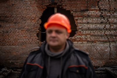 PHOTO ESSAY: Energy workers risk their lives to keep Ukraine's lights on as Russia attacks