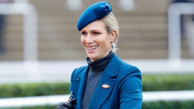 Thigh-high boots and bold blue - Zara Tindall's winter style combines warmth, comfort and style