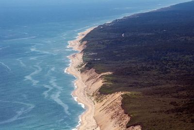 A Cape Cod town spent $10M last year to add more sand to its beach. Half is already gone