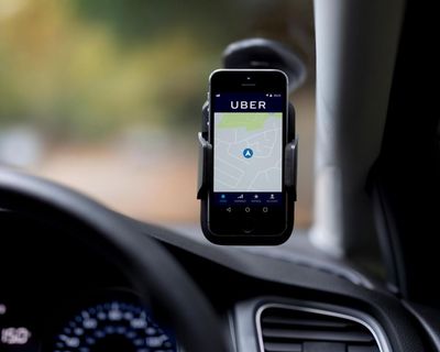 Uber hit with legal demands to halt use of AI-driven pay systems