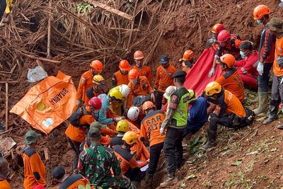 More bodies found after Indonesia landslides, raising toll to 23 with 28 missing