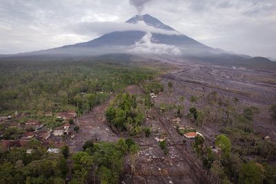 More than 170 climbers rescued as Mount Semeru eruption blankets villages in ash