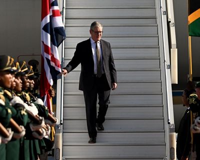 Starmer accuses ‘spineless’ Farage of failure to tackle racism in Reform party