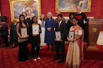 Queen Camilla celebrates Commonwealth essay winners after they tour The Standard newsroom