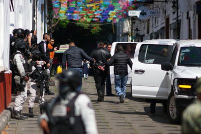 Authorities arrest 7 bodyguards in connection with a Mexican mayor's assassination