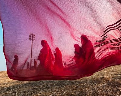 ‘The flowing red saree on the bank of the Ganges was incredibly striking’: Divyanshu Verma’s best phone picture