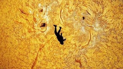 'It was an incredible moment.' Skydiver plunges across the face of the sun jaw-dropping astrophotographer photo