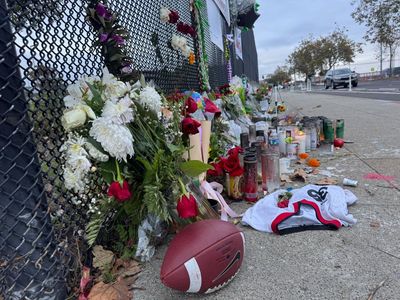 ‘I used to call him on Father’s Day’: Oakland shattered by football coach’s killing