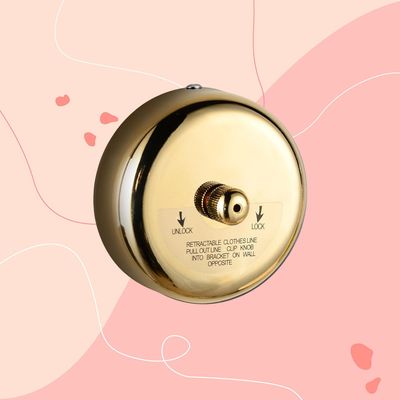 This £14.99 brass retractable clothes line is the small-space laundry upgrade worth knowing about – and I can see why