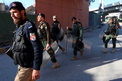 Three killed as gunmen and suicide bombers attack Pakistan paramilitary force headquarters