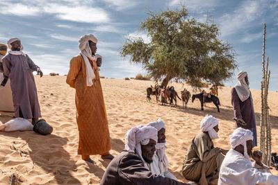 How rolling sand dunes are creeping up on last remaining oases on edge of Sahara