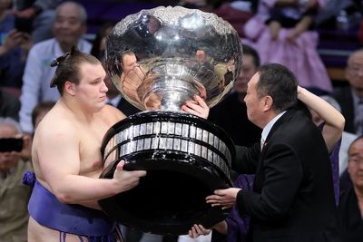 Ukrainian who fled homeland following Russian invasion wins elite sumo championship in Japan